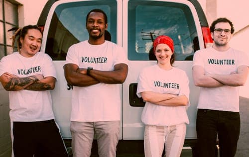 KHI volunteers together at a community program